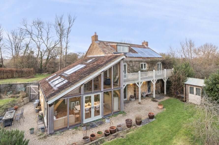 Oak frame extension to a period stone farmhouse